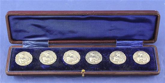 A cased matched set of six Edwardian Art Nouveau silver buttons, 1in et infra.